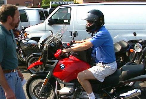 Art and David discuss David's riding apparel, as David heads out for a test rides on the BMW R1100GS.